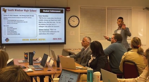 South Windsor High School Principal Joseph Leroy explaining the rules of Teached to SWHS Staff.  