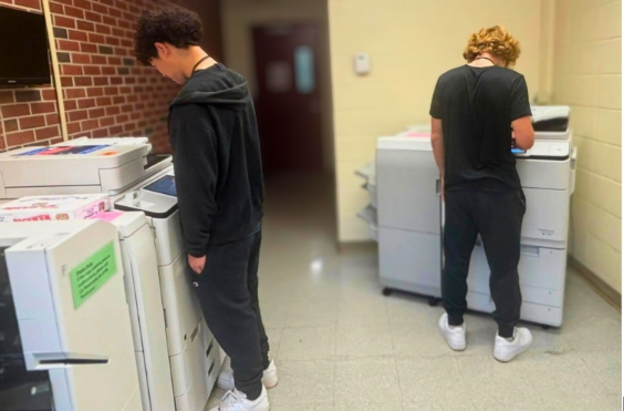 SWHS students making photocopies for staff members in the building.