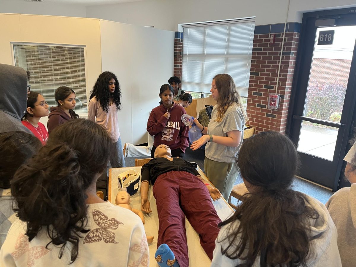 Executive Board members brought medical props for members to explore and interact with, such as a CPR dummy. 