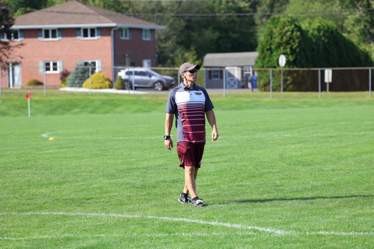 Head coach Peter Lepak prepares before the Bobcats game against Lewis Mills.