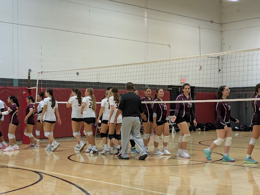 South Windsor and Bristol Central congratulate each other after the home opener.