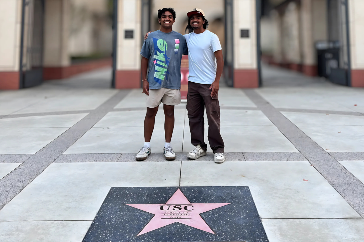 Students Aneek and Aneesh Roy in front of USC cinematic arts school where they learn media. (Photo courtesy Aneesh Roy)