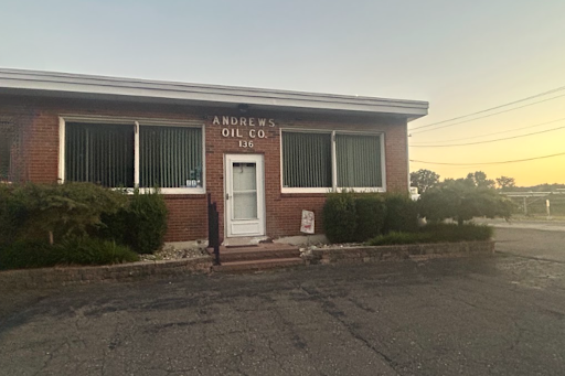 Exterior look of the of Andrew’s Oil Co. location at sunset.