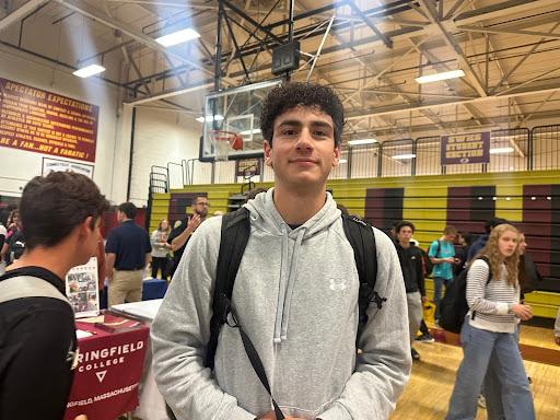 Junior Camden Lewie Explores the college fair to look for future opportunities.