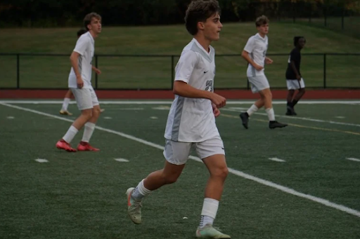Fullback for South, Haris Zhinipotoku, pressing the ball against an attack (photo taken by Martin Tushe).