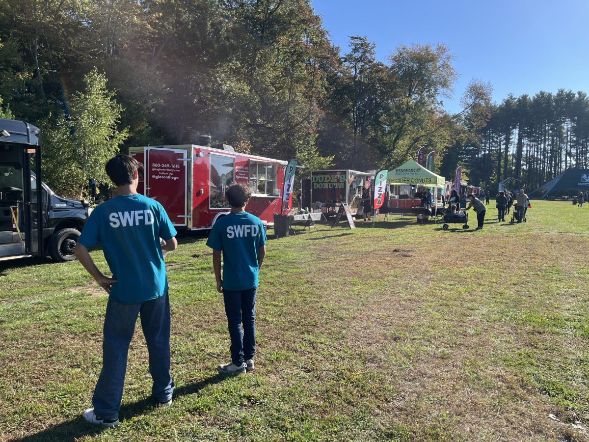 Members of the South Windsor Fire Explorer Post exploring the vendors at the Apple Fest