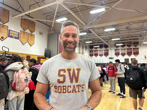 South Windsor High School guidance counselor Mr. Peters sharing ideas on college fair.