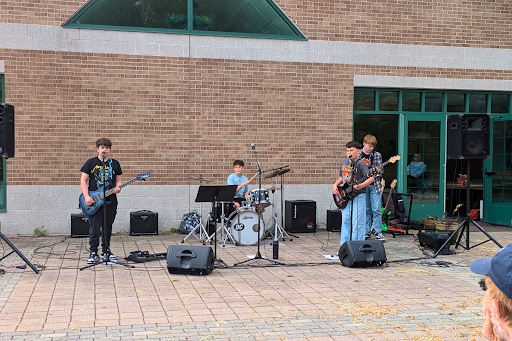 The band Second Generation is shown rocking out for a good cause. (Photo credit: Marietta St Onge)