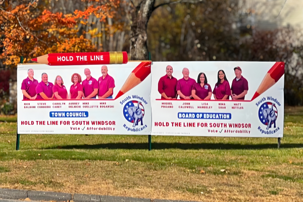 A billboard of the Republican representatives running for town council.