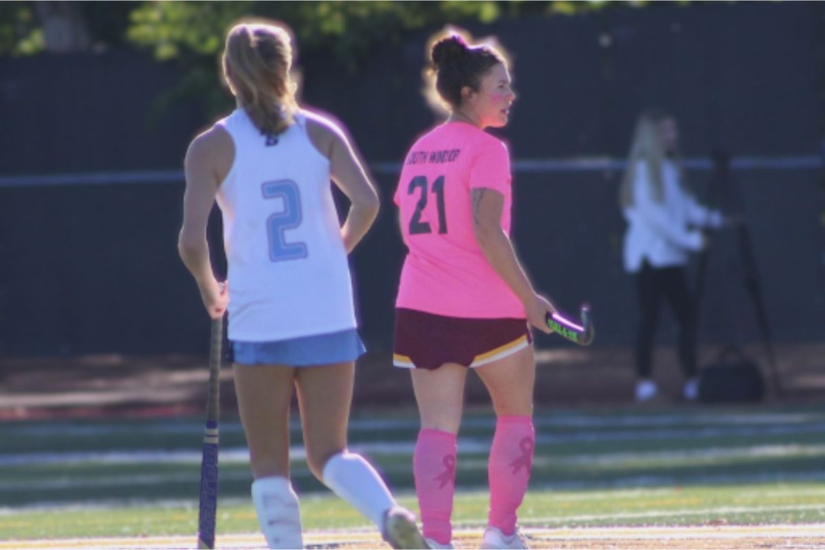 Senior Reese Pellerin marks a player from East Catholic. (Photo by Kinley Cincotta.)
