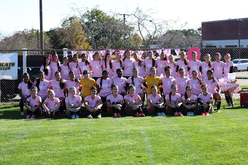 South Windsor Girls Soccer Varsity and JV celebrate Pink Out together.