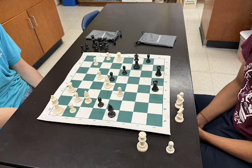 Two students engaged in a chess match at South Windsor High School’s Chess Club