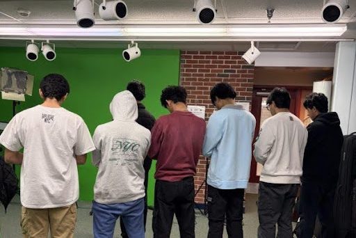 Muslims students performing the congregational prayer in the South Windsor High School basement. (photo courtesy of Fatimah Majid)
