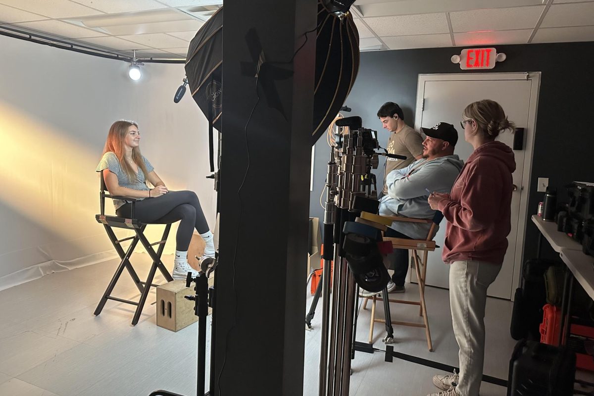 Senior Mallory Mead interviews with Burden Media to create her capstone project, a guide for freshman students on how to navigate the challenges of high school. (Photo courtesy of Mallory Mead)
