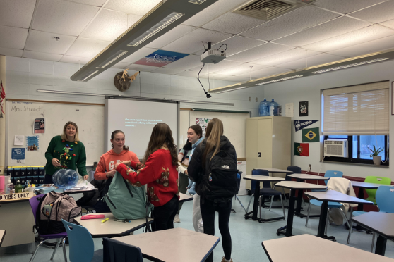 Students pack up after creating their posters in their Modern World History Class. 