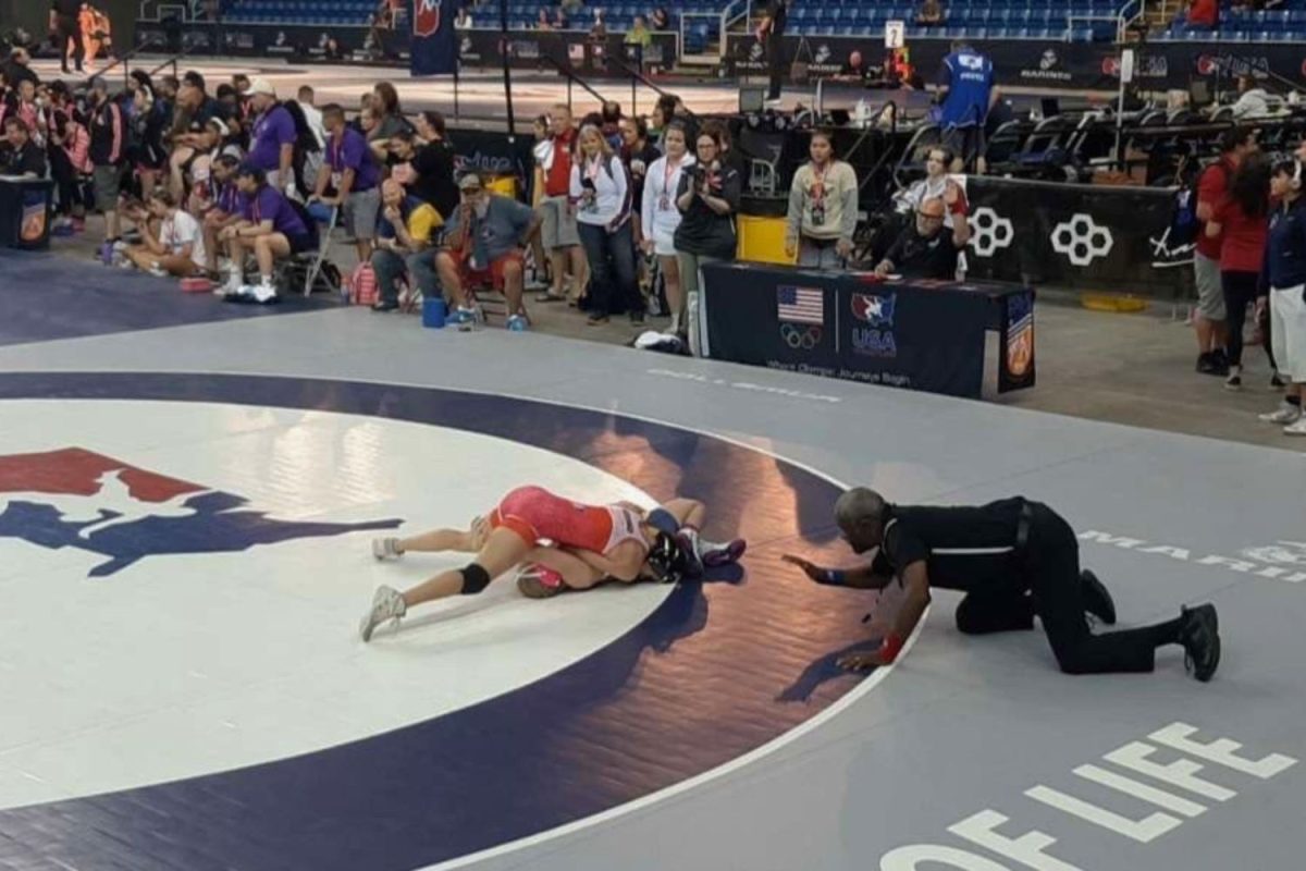 Sophia Gordon pins her opponent at Fargo nationals gaining a win and contributing to the CT girls teams score. (photo courtesy of Madeline Gordon)
