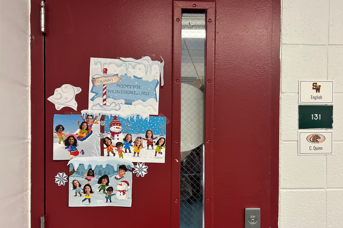 Mrs.Quinn's door this year to keep the Holiday feeling alive.