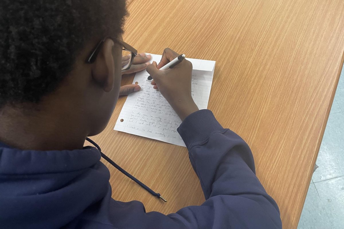 Students in NHS Letters to the Elderly Committee write letters to promote inclusion. 