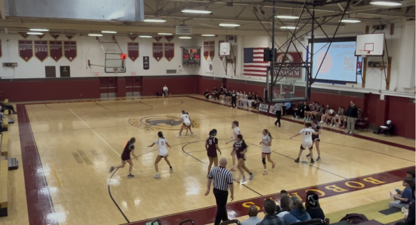 The girls basketball team playing Tolland on Wednesday, February 11th during the second half 