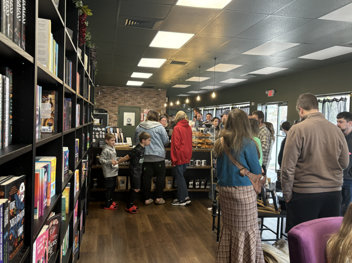 Patrons line up to purchase baked goods, coffee and tea on opening day at Wicked Press. (Jamie Howe)