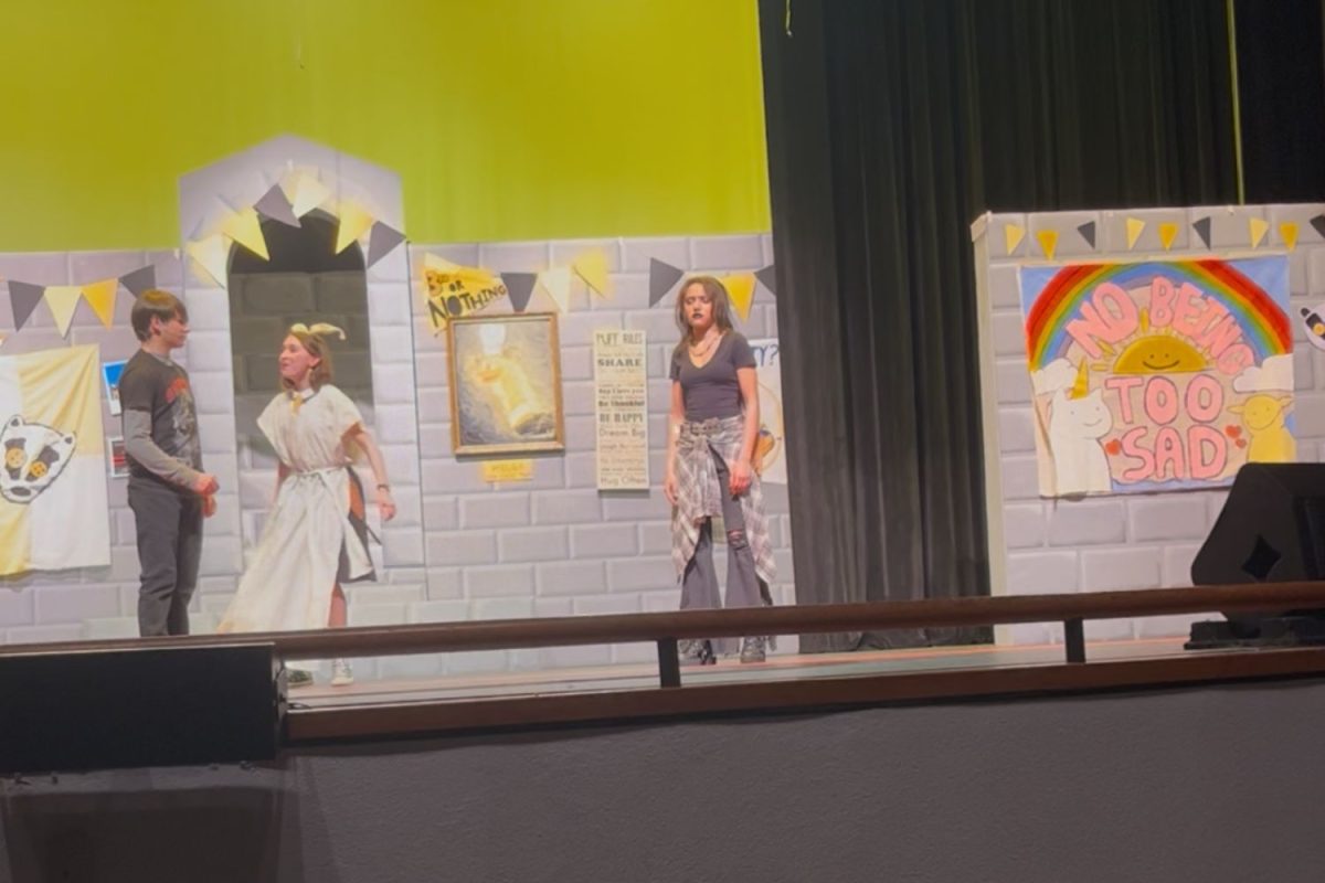SWHS students perform a scene with the character 'Dobby' from Puffs.