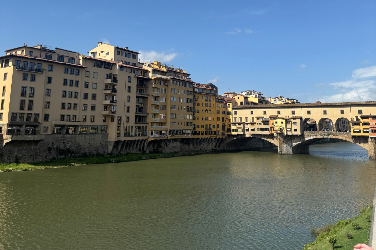 A scenic outlook of the Arno and Ponte Vecchio in Florence, Italy.