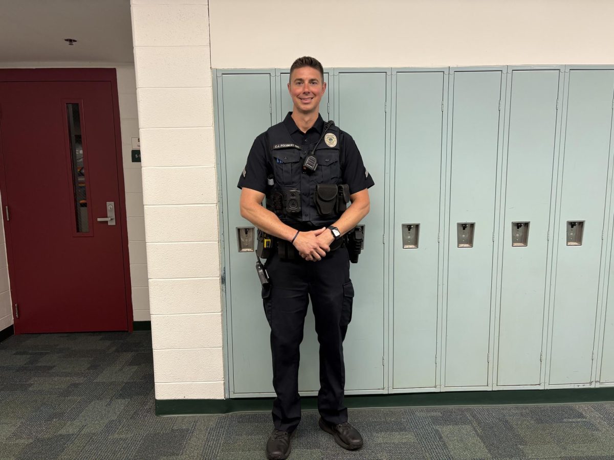New SRO Corporal Chris Poehnert poses for a photo during his first week of training with Officer Weiss